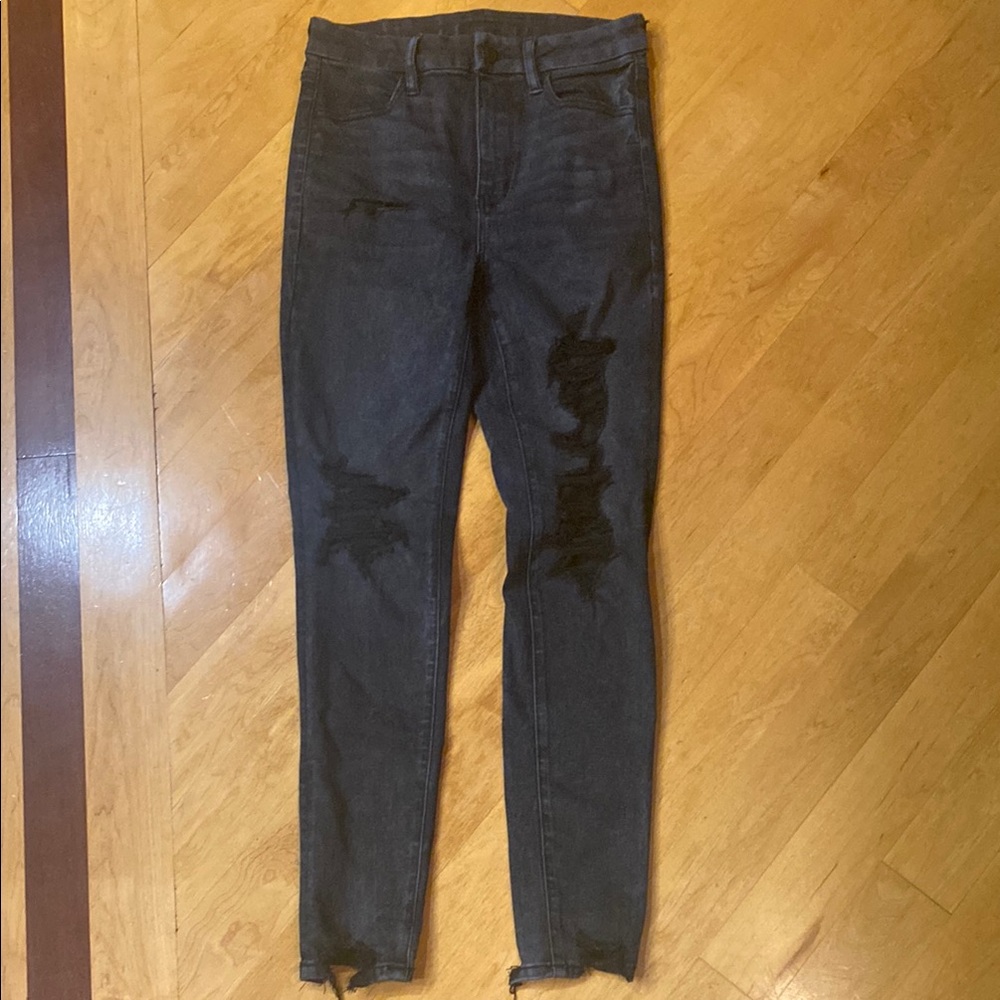 Woman’s American Eagle Outfitters Dark Gray Distressed Jeans